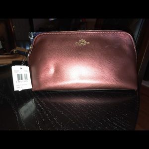 Coach cosmetic case in burgundy